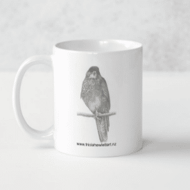 Falcon artwork by Tricia Hewlett on a mug